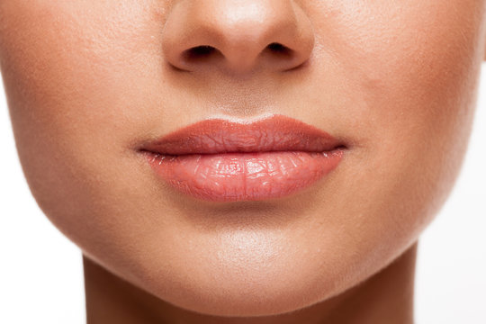 Close up of woman with natural makeup in studio photo
