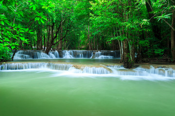 Deep forest waterfall at Huay Mae Kamin waterfall National Park Kanjanaburi Thailand