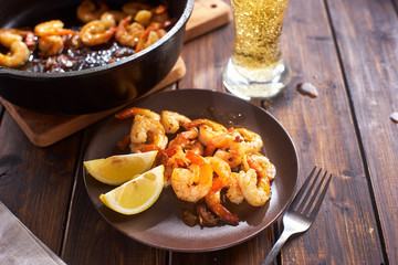 Fried shripms and glas of beer for dinner