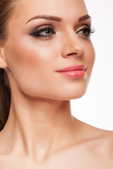 Fototapeta premium Blonde model with professional make up on white background