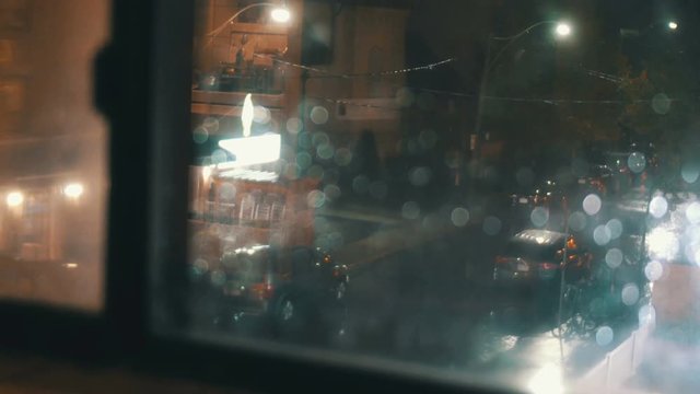 Street Corner As Seen Through A Rain Window.