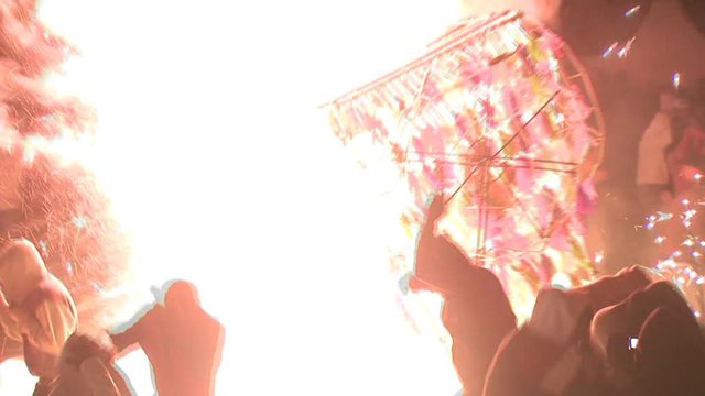 Torito shoots out fireworks into the crowd shot on the point of view of a by standard 16