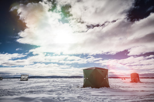 Ice Smelt Fishing Shack During A Cold But Sunny Day Of Winter In Quebec