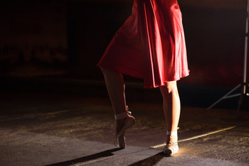 The legs of the dancer.