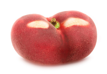 Flat nectarine isolated on white. Full depth of field.
