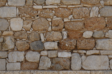 Stone wall texture, Wall made of stone formed in rough block shapes, Textured effect