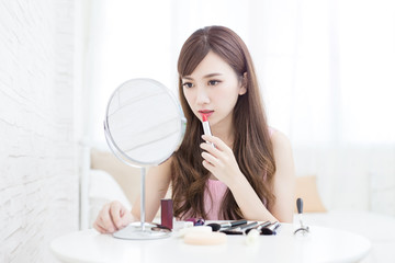 beauty woman use lipstick