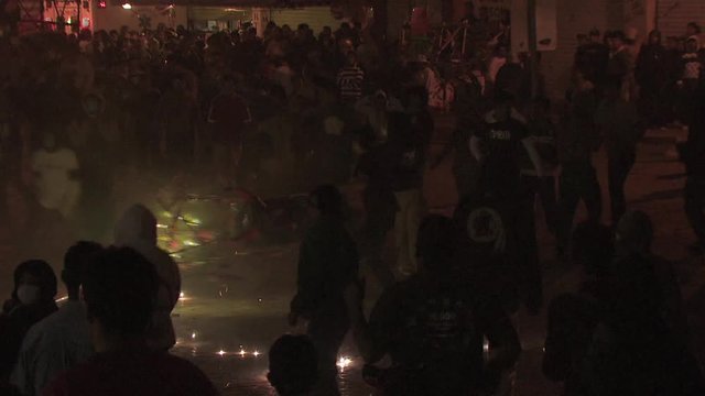 Torito shoots out fireworks into the crowd shot on the point of view of a by standard 12