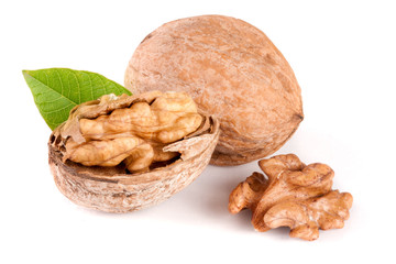 Walnuts with leaf isolated on white background