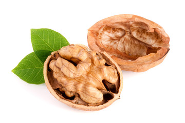 Walnut with leaf isolated on white background