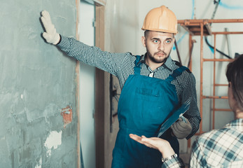 Professional plasterer is ready to plaster the walls