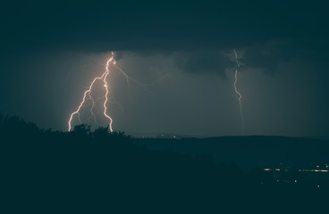 Fototapeta na wymiar Lightning Strikes Stormy Night