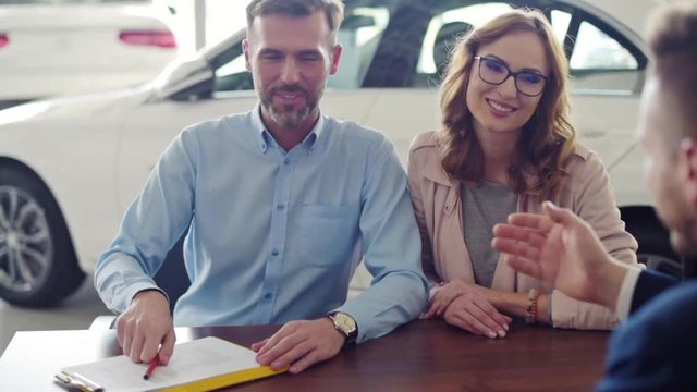 Couple marriage buing a new car