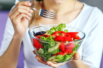 Vegetable salad of tomatoes, cucumbers and lettuce salad. Breakfast. The concept is healthy food, diet, vegetarianism, weight loss.