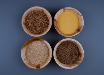 Four sorts of cereals in bowls.