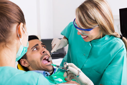 Terrified Client In Dental Clinic