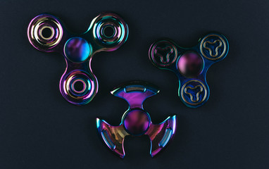 Group of hand fidget spinner toy.