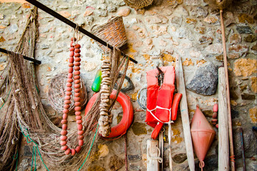 Old ancient fishing nets and tackes, small fisherman village Avola, Sicily, Italy