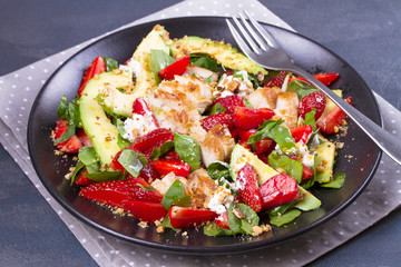 Strawberry, avocado, spinach salad with chicken