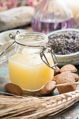 Nature cosmetics, handmade preparation with essential oils and ancient minerals of  perfume, creams, soaps from fresh and dried lavender and roses flowers, wheat, almond nuts, green clay powder