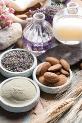 Nature cosmetics, handmade preparation with essential oils and ancient minerals of  perfume, creams, soaps from fresh and dried lavender and roses flowers, wheat, almond nuts, green clay powder