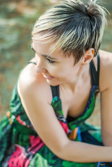 Naklejka premium Beautiful young woman in the middle of rural, trees, river, nature