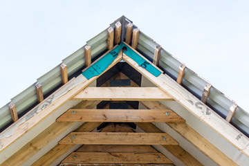 fragment of hardwood roof construction