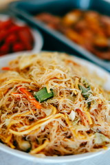 Tasty stir fry rice noodle with meat and vegetables, Asian food celebration