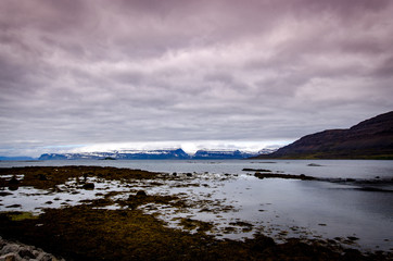 Reflections of clouds and Mountains