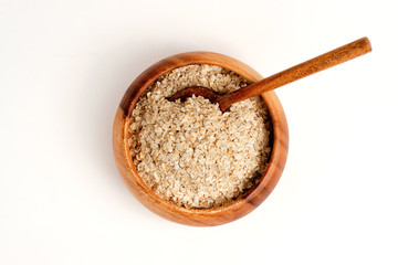 Oatmeal inside wooden bowl