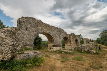 Ruines of Roman aqueduct near Fontvieille in Provence region of France