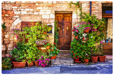 Charming floral decorated streets of medieval towns of Italy. Spello in Umbria