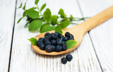 Spoon with blueberries