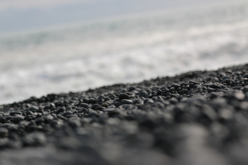 Pebbles on the black beach in Vik, Iceland
