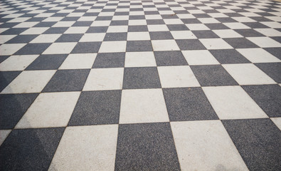 Black and White ceramic floor condition with grid line for background. Black and white walkway checkered pavement floor tiles seamlessly as a pattern.