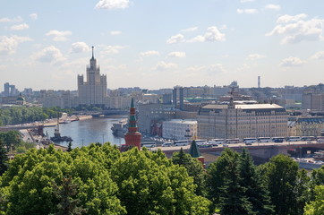 Fototapeta na wymiar Moscow, Russia - July 11, 2017: Top view of the embankments of the Moscow-river and the skyscraper on Kotelnicheskaya embankment
