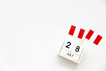 Fototapeta na wymiar July 28 Wooden calendar Concept independence day of Peru and Peru national day.Copy space,minimal style