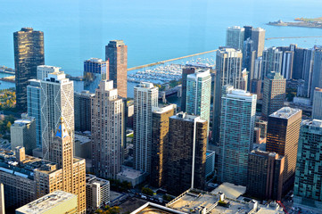 Fototapeta premium Chicago skyscrapers, Illinois state city, famous for the fountain and the magical colors of autumn, in the city park