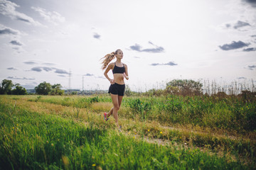 A young girl jogging outdoor