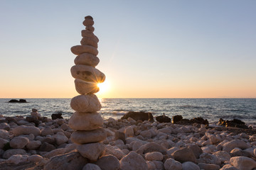 Fototapeta na wymiar Stone tower by the beach