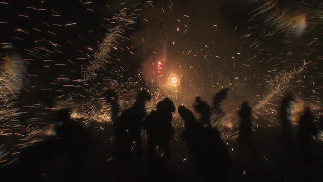 Torito shoots out fireworks into the crowd shot on the point of view of a by standard 20