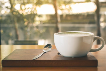 Green tea cup in cafe shop time to relax ,hipster tone and soft of focus