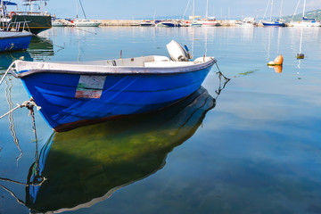 Fishing boat are moored in marina of Balchik city in black sea coast at Bulgaria
