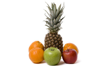 photo of oranges, apples and pineapple on a white background