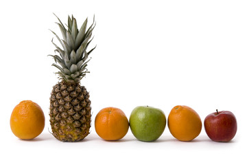 photo of oranges, apples and pineapple on a white background