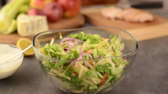 Waldort salad prepare and serving, stock footage