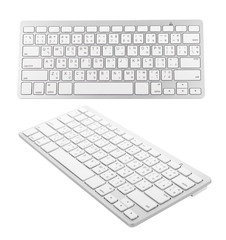 White wireless keyboard on white background