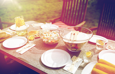table with food for dinner at summer garden party