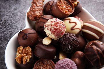 a lot of variety chocolate pralines, belgian confectionery gourmet chocolate