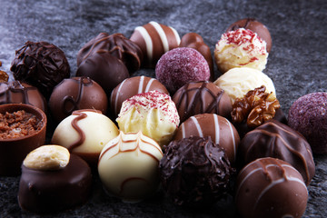 a lot of variety chocolate pralines, belgian confectionery gourmet chocolate